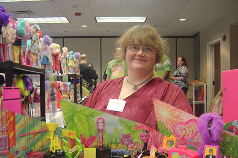 Liz Pemberton is the organizer of the 2015 JemCon, the original Jem & The Holograms fan convention, taking place at the Holiday Inn Lansdale, Aug. 28-30, 2015.