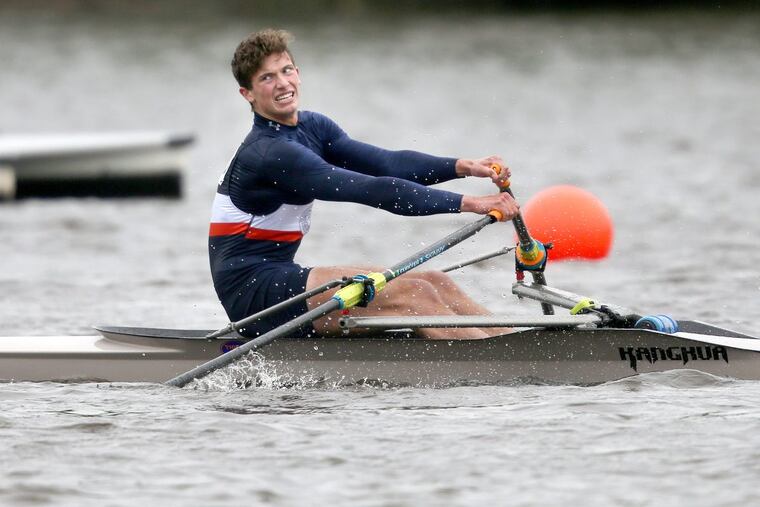 Germantown Friends School’s James Wright crosses the finish line in Friday afternoon’s senior single heat.