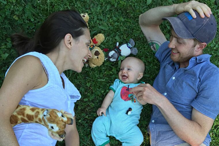 Jean Friedman-Rudovsky, Sebastian Malter, and baby Quinn Rudovsky-Malter, along with Osito the stuffed bear and Penguina the stuffed penguin. ( Photo: Eve Friedman-Dekro )