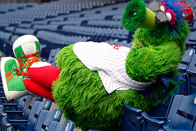 The Phillie Phanatic relaxes in the stands at Citizens Bank Park. (David Maialetti/Staff Photographer)