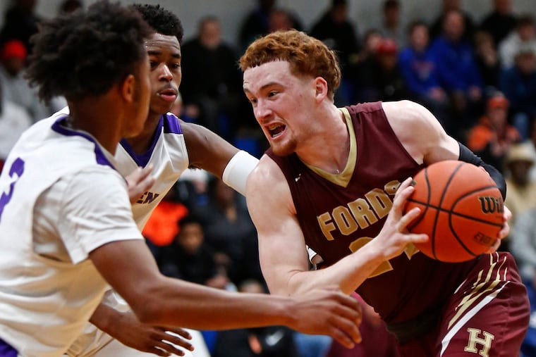 Haverford School guard Christian Ray drives against Camden guard Nasir Lett during the fourth quarter of a Winter Classic basketball game Saturday, Feb. 9, 2019, at Paul VI. Haverford went on to win, 51-46. LOU RABITO / Staff