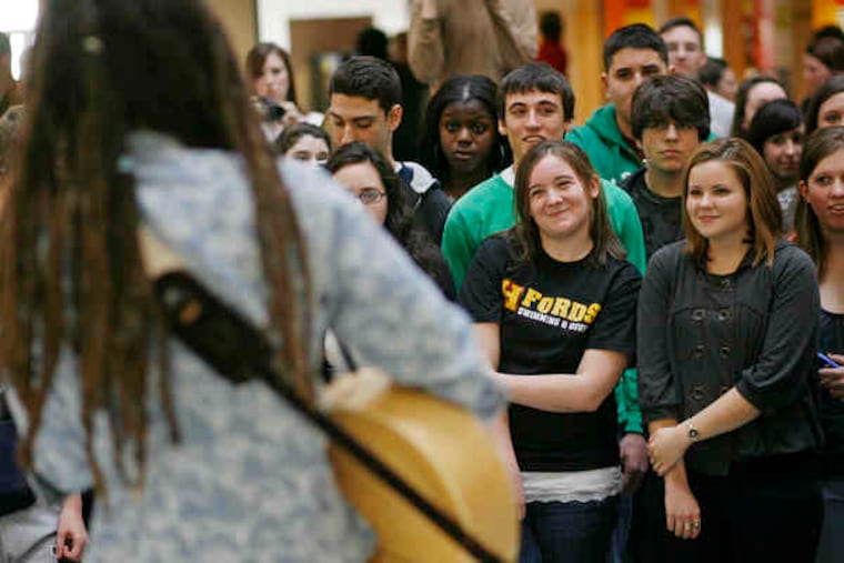 Jason Castro entertains students at Haverford High School.