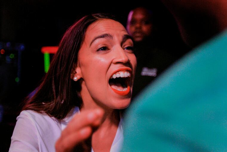 New York Democratic Congressional candidate Alexandria Ocasio-Cortez speaks to supporters, Tuesday, Nov. 6, 2018 in Queens the Queens borough of New York, after defeating Republican challenger Anthony Pappas in the race for the 14th Congressional district of New York. (AP Photo/Stephen Groves)