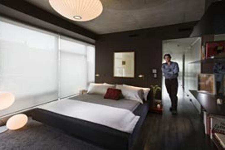 The condo was originally intended to have three bedrooms, but Schatz, thinking bachelor pad, had it finished with just one. Now, a second bedroom is planned.