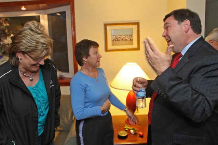 with Pat Betz (left) and Mary Anne Benner in Benner's home in the Northeast. "Dan's problem right now is the lack of campaign money," political strategist Larry Ceisler said.