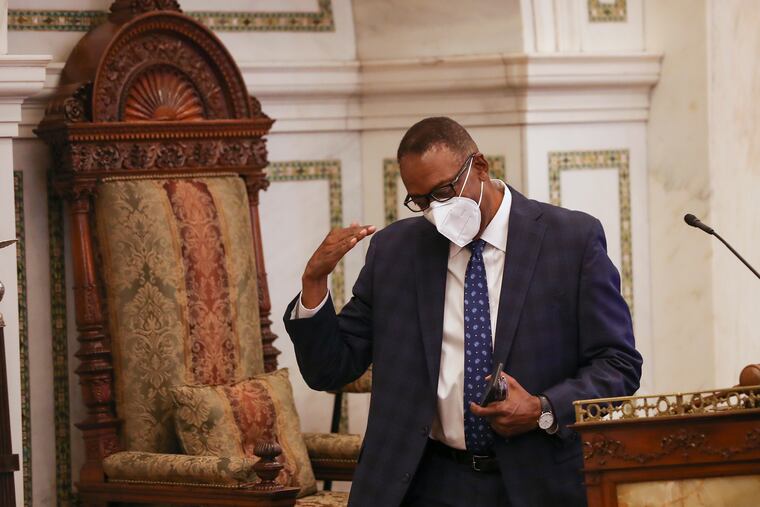 City Council President Darrell Clarke salutes before presiding over a Council meeting in September. He's working on a bill to get more housing built for low-income residents in his district.