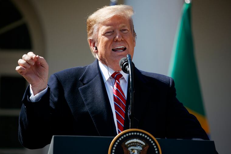President Donald Trump speaks during a news conference with Brazilian President Jair Bolsonaro in the Rose Garden of the White House, Tuesday, March 19, 2019, in Washington.