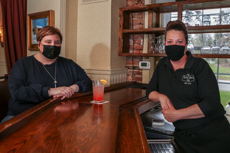 Quakertown's Emily George (left) collected money through Venmo to be given as surprise, inflated tips to local restaurant servers, including Wendy Mosko (right), who works at The Brick Tavern and received a $600 gratuity.