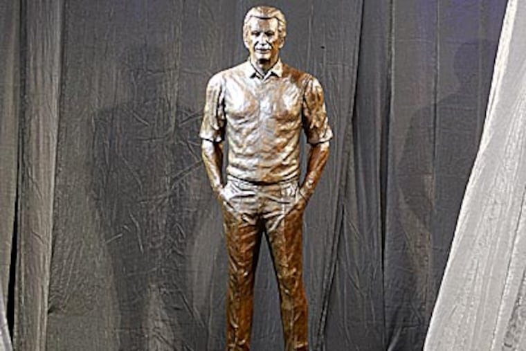 A bronze sculpture of Milwaukee Brewers radio announcer Bob Uecker is unveiled outside of Miller Park (Gary Porter/AP/Milwaukee Journal Sentinel)