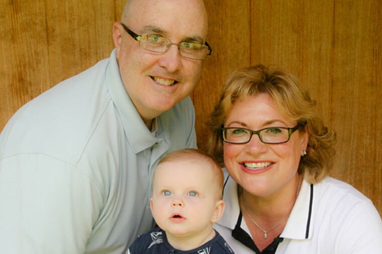 Brian and Amy Lyons, with their son Jack. (Pictures by Allison SanGiacomo Photography)