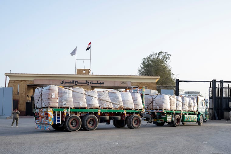 A truck enters the Egyptian gate of the Rafah crossing, heading for inspection by Israeli authorities before entering the Gaza Strip on Tuesday.