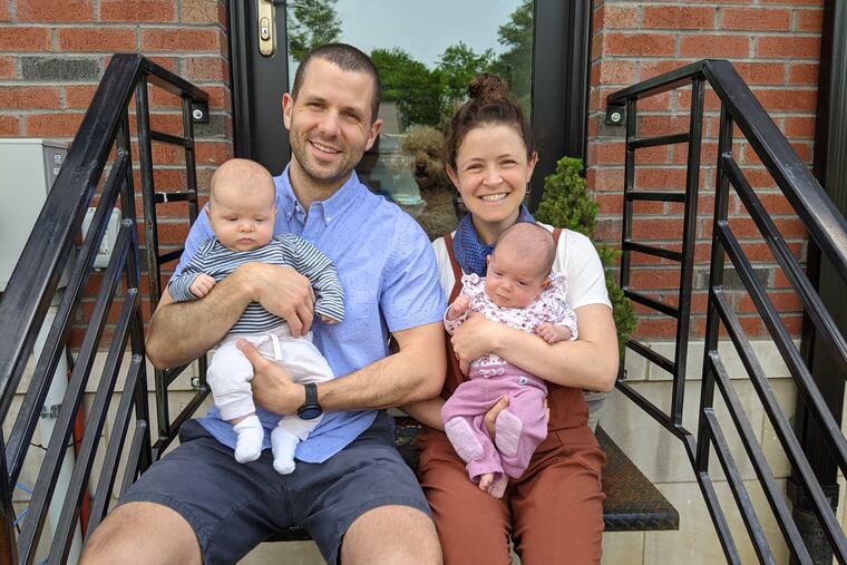 Jonathan and Emily with twins Benjamin (left) and Miriam.