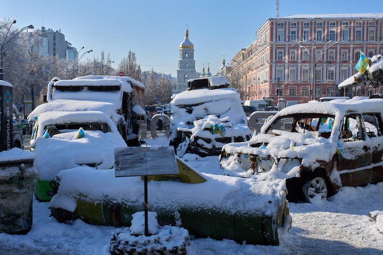 Snow-covered,= damaged Russian military vehicles are on display in downtown Kyiv, Ukraine, Friday, Jan. 16, 2026.