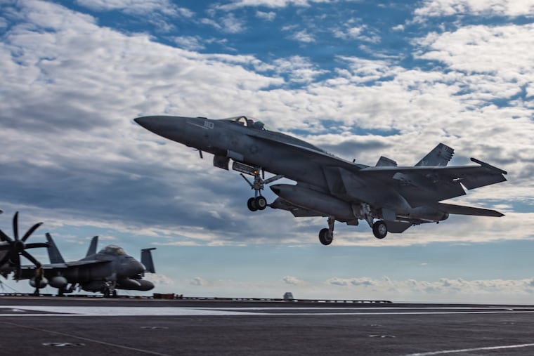 This image provided by U.S. Central Command shows a F/A-18E Super Hornet landing on the USS Gerald R. Ford (CVN 78) in support of Operation Epic Fury, on Sunday, March 1, 2026.