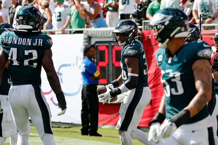 Eagles linebacker Jihaad Campbell celebrates his fourth-quarter interception.