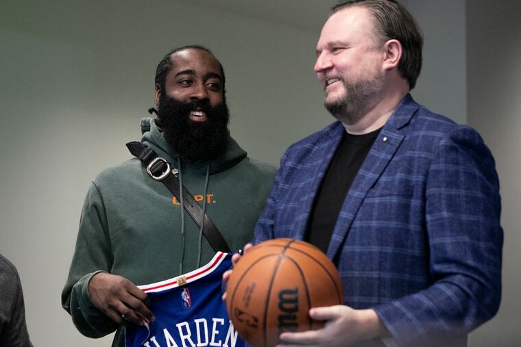 Daryl Morey (right) stands next to James Harden during photographs following a press conference formally introducing both Harden and Paul Millsap at the Philadelphia 76ers Training Complex in Camden on Tuesday.