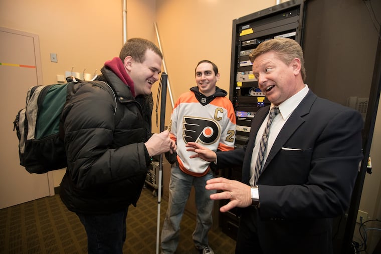 Flyers radio Pxp man Tim Saunders (right), pictured here in 2018, has been suspended for the next two broadcasts due to a "inappopriate comment."
