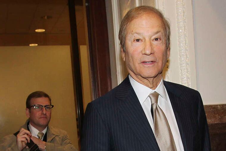 Lewis Katz leaves court yesterday, where one of his requests was dismissed.