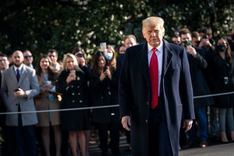 U.S. President Donald Trump turns to reporters as he exits the White House to walk toward Marine One on the South Lawn on Jan. 12.
