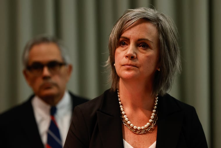 Jacqueline Maguire, then in charge of the FBI's Philadelphia field office, listens to questions from the media after announcing the arrest of a 17-year-old in connection with a terrorism probe at the Philadelphia District Attorney’s Office on Aug. 14, 2023.