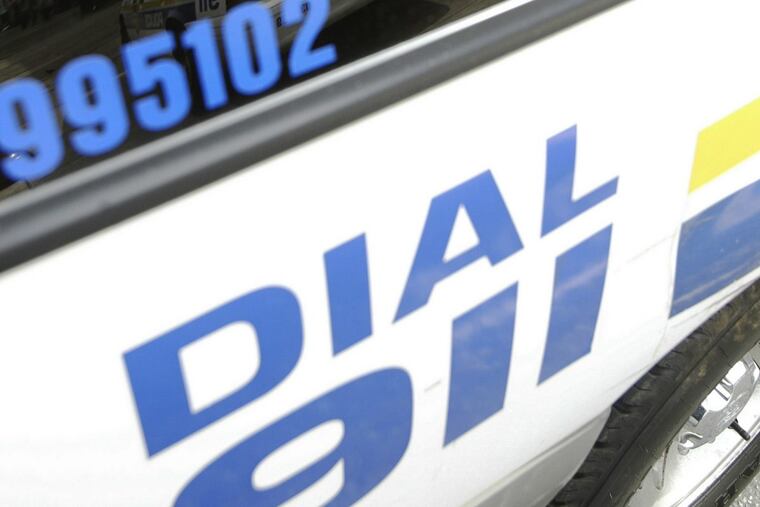 A Philadelphia Police car at a crime scene.