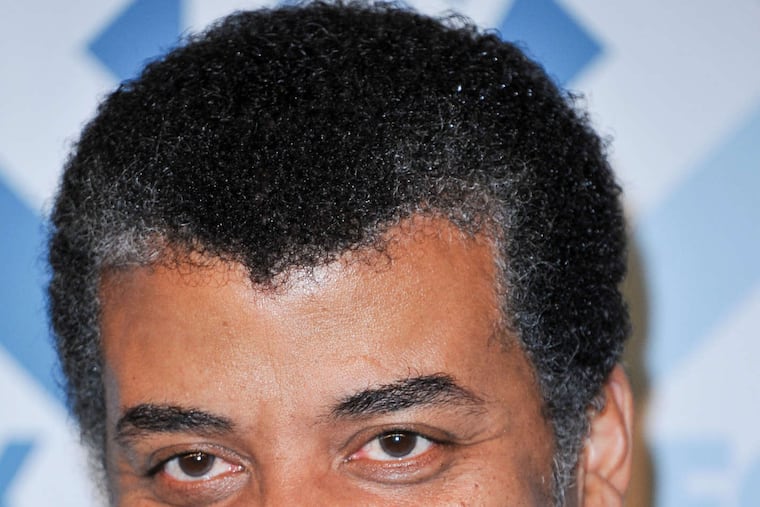 Neil deGrasse Tyson : Knows a thing or two about Earth. ASSOCIATED PRESS