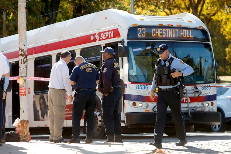 Police investigate the shooting death of a Route 23 SEPTA bus operator in the Germantown section of Philadelphia on Oct. 26, 2023.