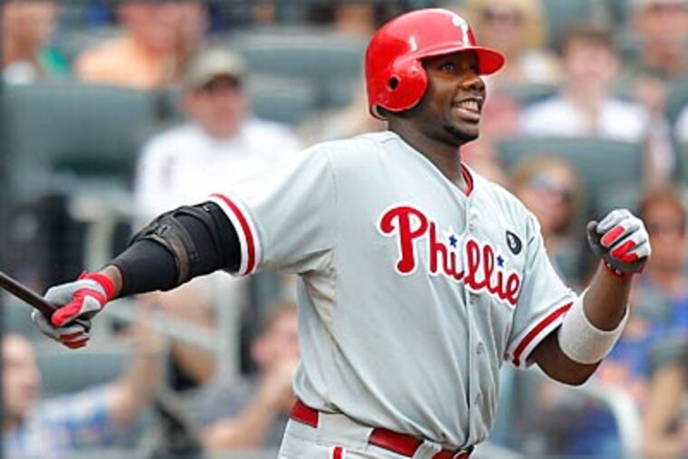 Ryan Howard strikes out in the ninth inning during the first game of Saturday's doubleheader. (Paul J. Bereswill/AP)