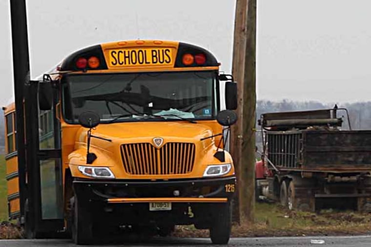 Scene of school bus and dump truck crash on Rt 528 Chesterfield Twp., February 16, 2012. ( David M Warren / Staff Photographer )