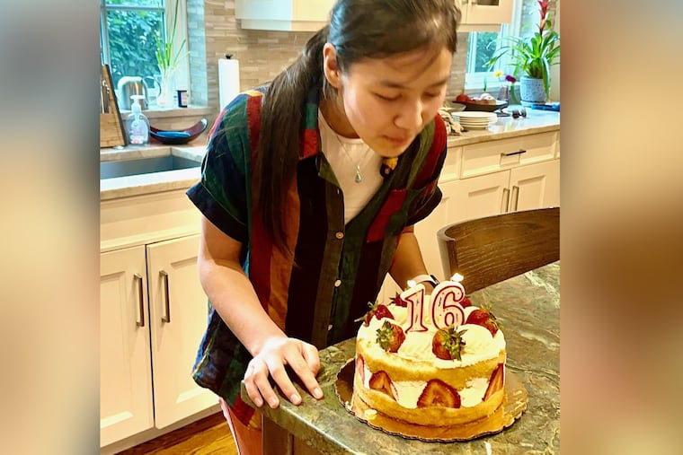 Maryam Ahmadi celebrating her birthday with her surrogate parents — the Obels — in the U.S. When she was 13, she arrived in the U.S. from Afghanistan without her parents, from whom she was separated during the bombing at Abbey Gate when the U.S. evacuated Kabul in 2021. She has not seen her parents since.