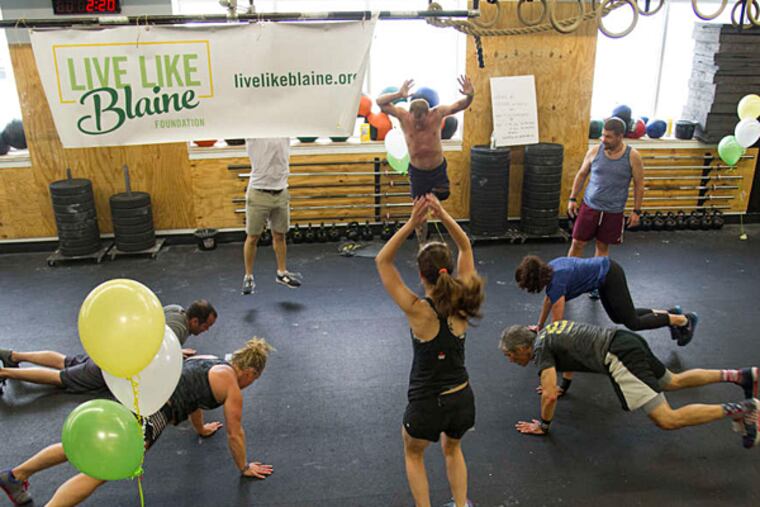 The Live Like Blaine Foundation supports female empowerment and leadership through fitness. In honor of Blaine Steinberg, who died suddenly, a "burpeethon" was held Sunday in Ardmore. (CLEM MURRAY / Staff Photographer)
