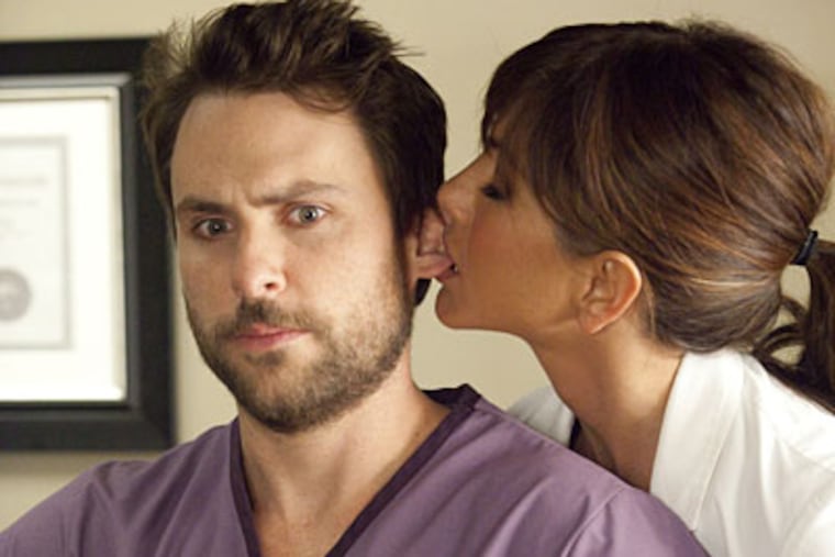 Charlie Day and Jennifer Aniston in "Horrible Bosses."