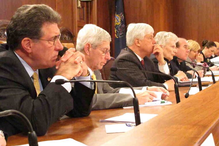 State senators probing the state's regulation of abortion clinics listen in Harrisburg yesterday as Philadelphia District Attorney Seth Williams describes unsanitary conditions at the West Philadelphia clinic run by Kermit Gosnell, who is facing murder charges.