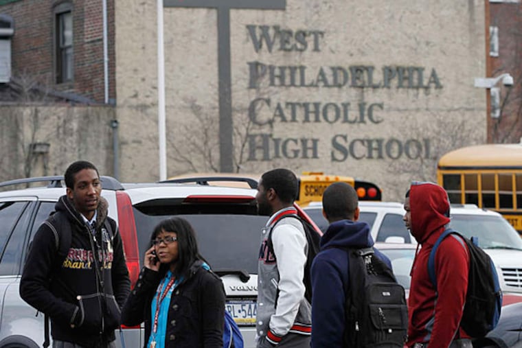 2012 file photo: At West Catholic High, students stand outside after learning that their school had been targeted for closing. It later won a reprieve. MICHAEL S. WIRTZ / Staff Photographer