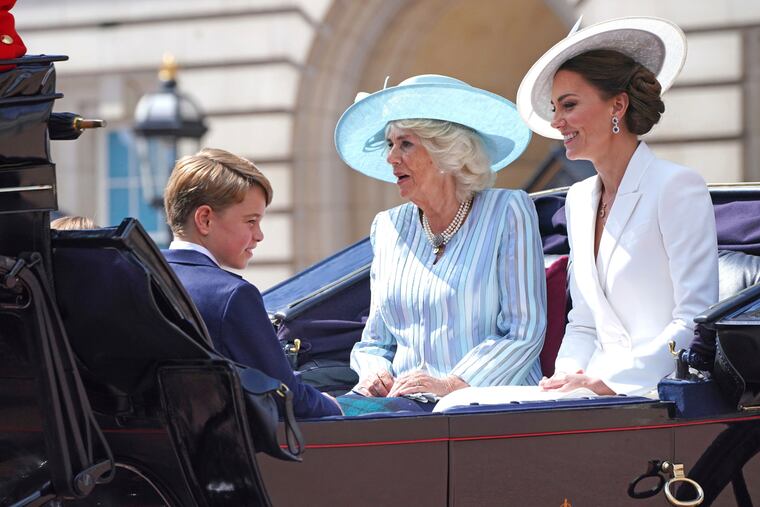 From left, Prince George, Camilla, Duchess of Cornwall, and Kate, Duchess of Cambridge, leave Buckingham Palace for the Trooping the Color ceremony at Horse Guards Parade in London.