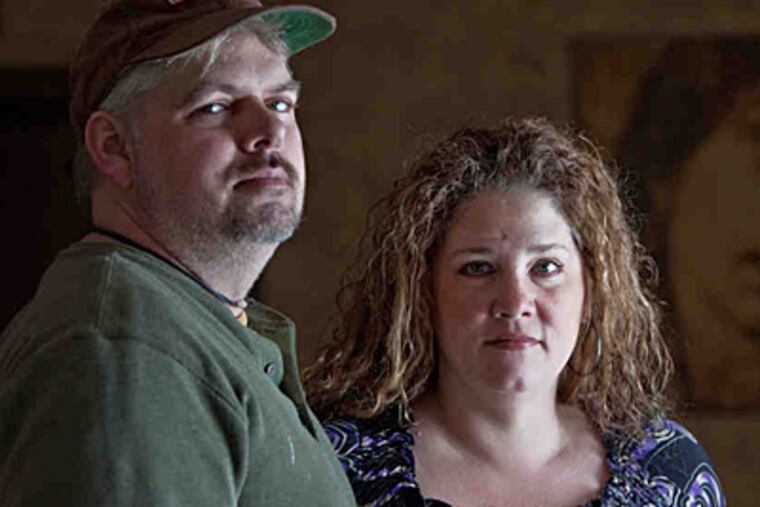 Mark and Angel Sullivan turned to DeMarco REI when they were struggling to pay the mortgage on their Moorestown home. (David M Warren/Staff)