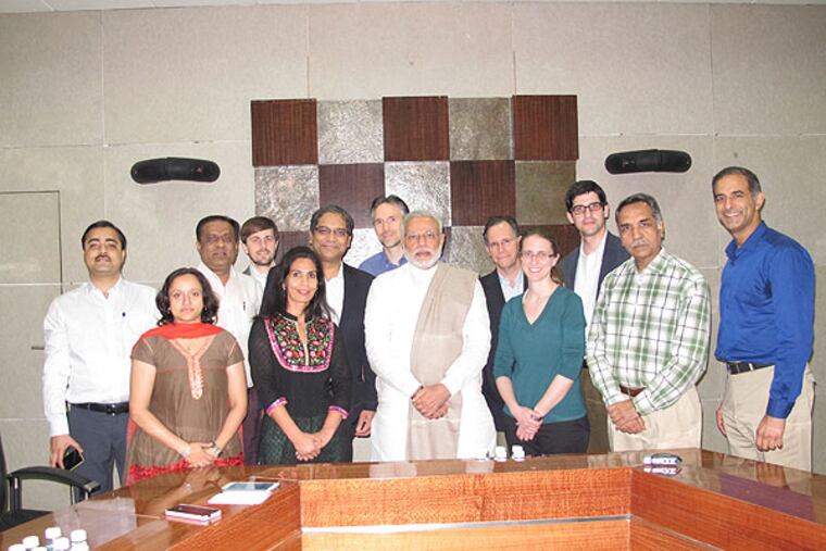 At the far right (in the blue shirt) is Dr. Aseem Shukla, director of minimally invasive surgery in the division of urology
at Children’s Hospital of Philadelphia. Third from left is Dr. Rakesh Joshi, professor and head of the department of pediatric surgery at Civil Hospital, Ahmedabad (a 2,000 bed multi-specialty hospital, the 2nd largest hospital in Asia). In the center, is Prime Minister Narendra Modi. Just to the right of Modi is Dr. Douglas Canning, chief of pediatric urology at CHOP and professor of surgery at Penn. (Photo supplied by Dr. Aseem R. Shukla.)
