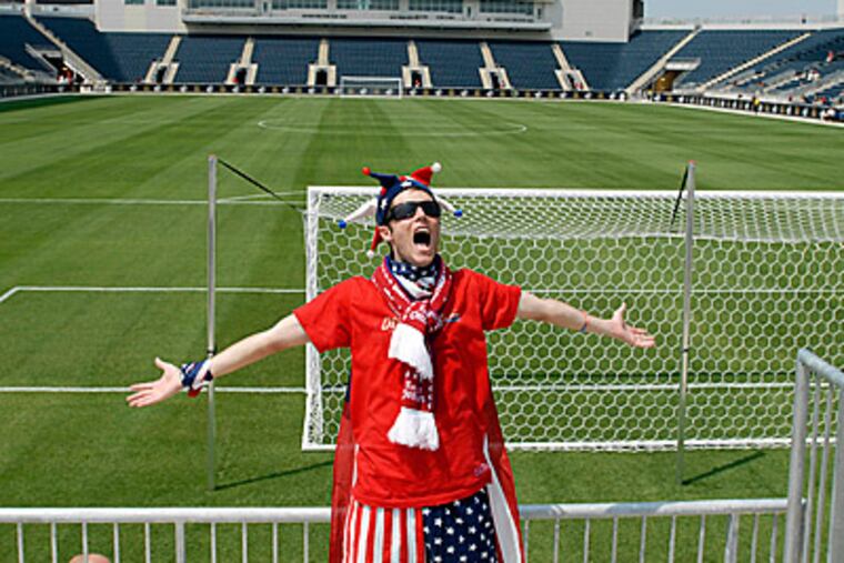 Corey Furlan leads the Sons of Ben in a cheer before the start of the U.S. game which was shown at PPL Park. (Ron Tarver / Staff Photogapher)