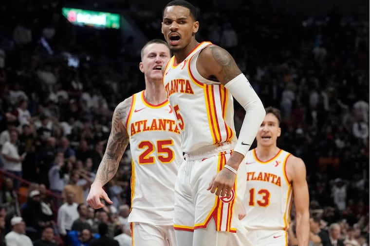 Hawks guard Dejounte Murray (5) reacts after scoring the game winning basket during the second half against the Miami Heat on Jan. 19.