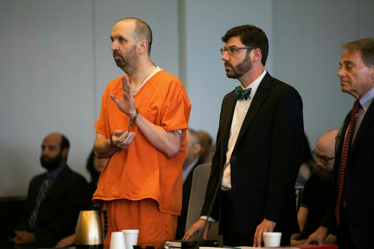 Craig Hicks pleads guilty to first-degree murder in the 2015 murders of three young Muslims at a Chapel Hill apartment Wednesday, June 12, 2019 at the Durham County Courthouse. Hicks will serve a life sentence in prison without the possibility of parole for killing his neighbors at the Finley Forest Condominiums: Deah Barakat, 23, his wife Yusor Abu-Salha, 21, and her sister Razan Abu-Salha, 19. (Travis Long/The News & Observer via AP)