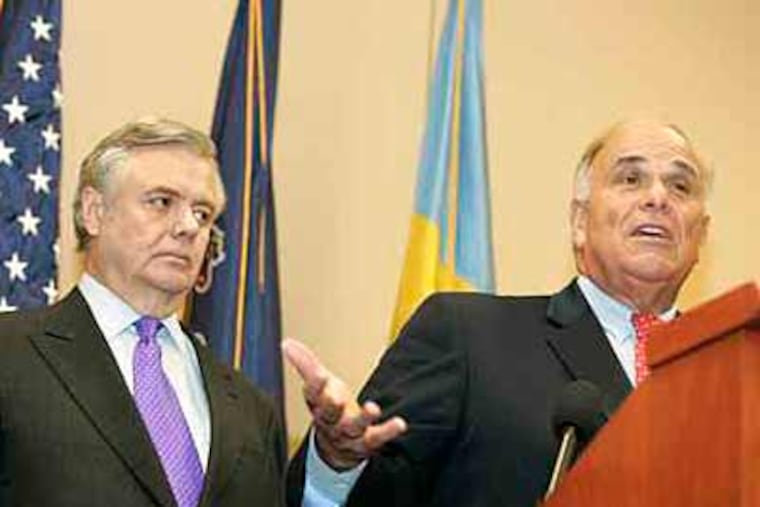 Gov. Ed Rendell took the stand this morning in the corruption trial of former State Sen. Vince J. Fumo, who is also testifying today. In this 2008 file, the two are seen as Fumo announced he was dropping out of the race for re-election. (Mike Levin/Staff Photographer/File)