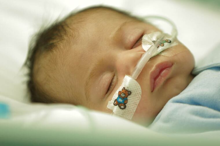 Osman Chandab, a seven-week-old being treated for whooping cough in the Royal Children's Hospital, Melbourne, Australia, helps illustrate a point in “Nova’s “Vaccines:Calling the Shots.”