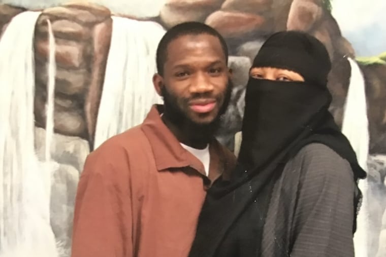 Johnny Berry with his wife, Qiana, at Graterford state prison.
