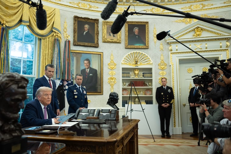 President Donald Trump speaks in the Oval Office alongside Defense Secretary Pete Hegseth in September.