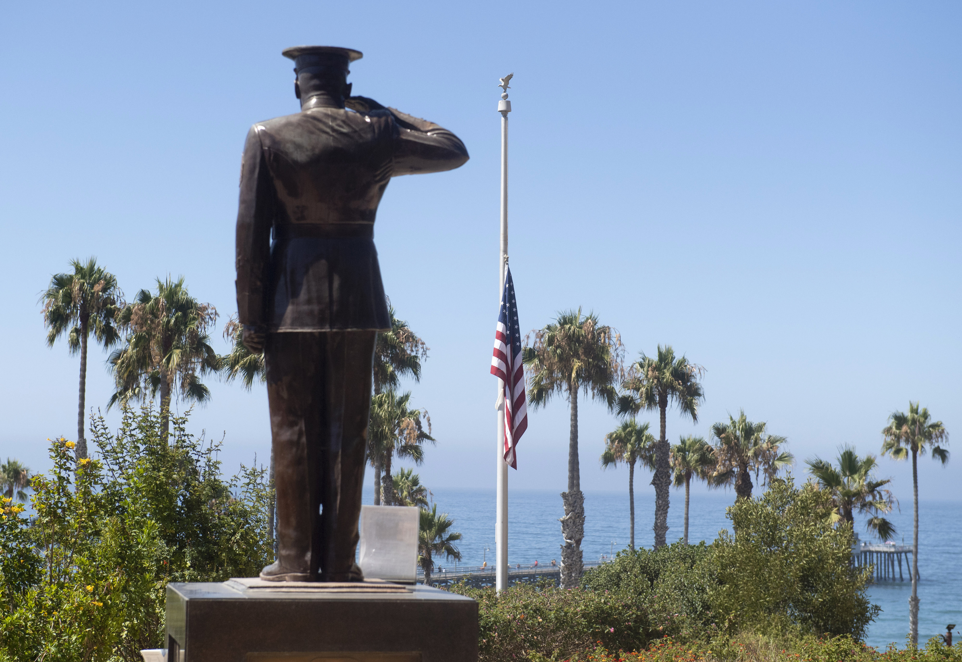 The U.S. flag was lowered to half-staff at Park Semper Fi in San Clemente, Calif., on Friday, July 31, 2020. Eight troops aboard a landing craft that sank off the Southern California coast during a training exercise are presumed dead, the Marine Corps announced Sunday, Aug. 2, 2020. The Marines said they had called off the search that started late Thursday afternoon when the amphibious assault vehicle sank with seven Marines and one sailor aboard.