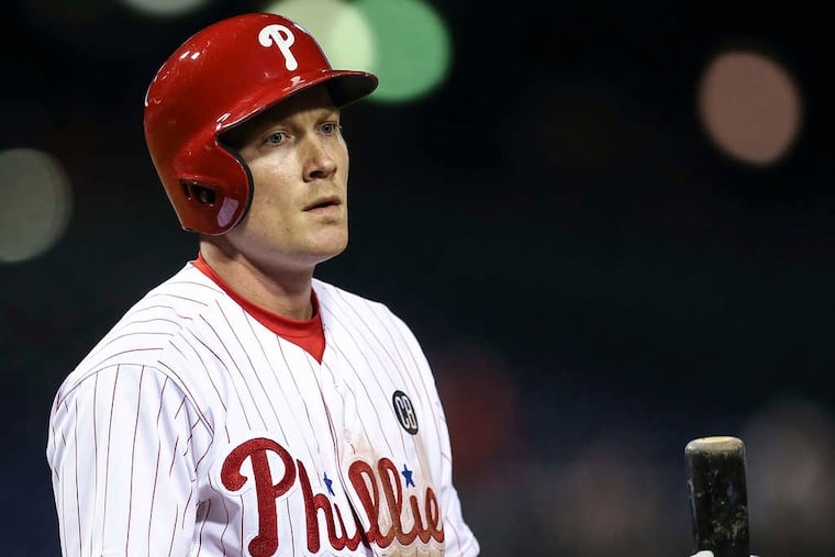 STEVEN M. FALK / STAFF PHOTOGRAPHER Cody Asche says he is trying to work on his swing, even as he sits while struggling at the plate.