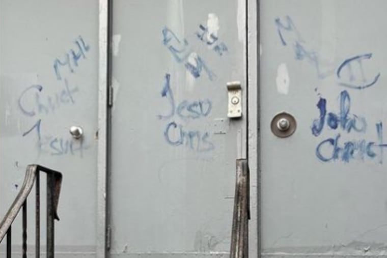 Vandalism on the Masjidullah Center for Human Excellence in Northwest Philadelphia. Security footage captured a suspect painting the mosque on Feb. 24.