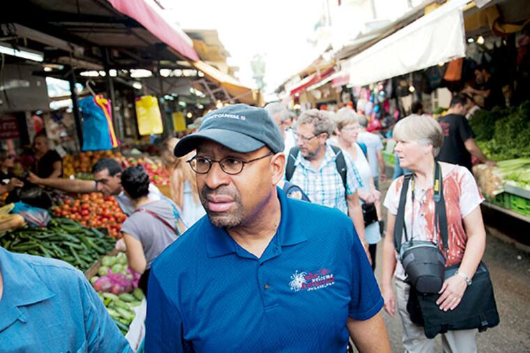 Mayor Michael Nutter visits a Tel Aviv Flea Market on Friday, November 8, 2013. (Kait Privitera / City of Philadelphia)