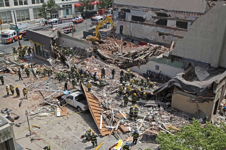The 2100 block of Market Street after the building collapse that leveled a thrift store and killed six in June 2013. Brandywine Realty Trust plans to develop the site into lofts, shops, and offices.