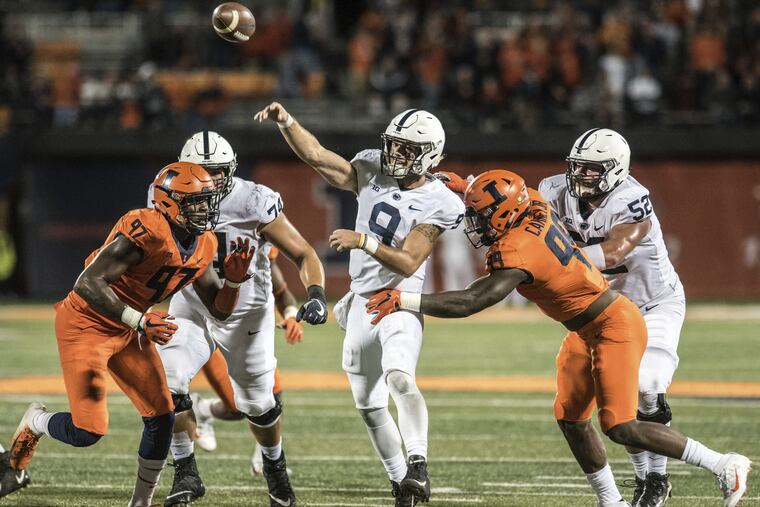Penn State quarterback Trace McSorley (9) throws the ball in heavy traffic in the second half of a college football game between Illinois and Penn State, Friday, Sept. 21, 2018, in Champaign, Ill.